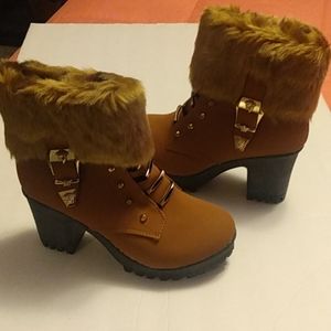 Brown 3 inch heel side zip dress ankle boots with buckel detail and fur. size 39